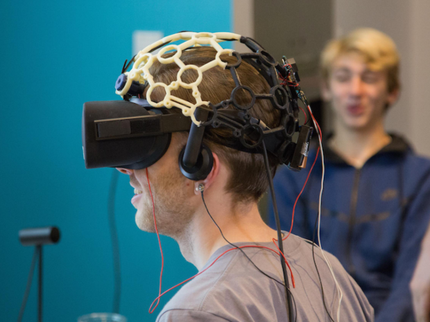student wearing VR headset student wearing VR headset