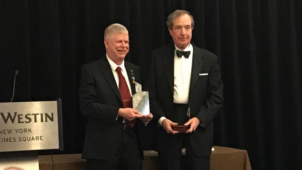 James Breakall presents the Armstrong Medal to Thomas Marzetta James Breakall presents the Armstrong Medal to Thomas Marzetta